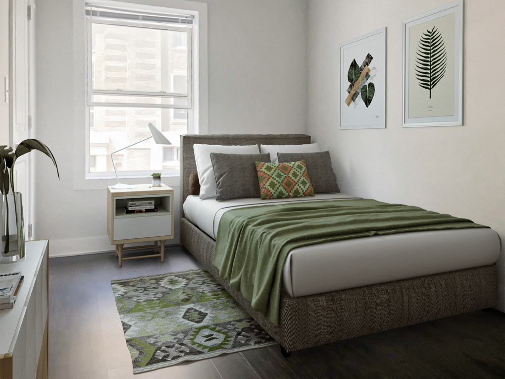 a bedroom with a bed and a window